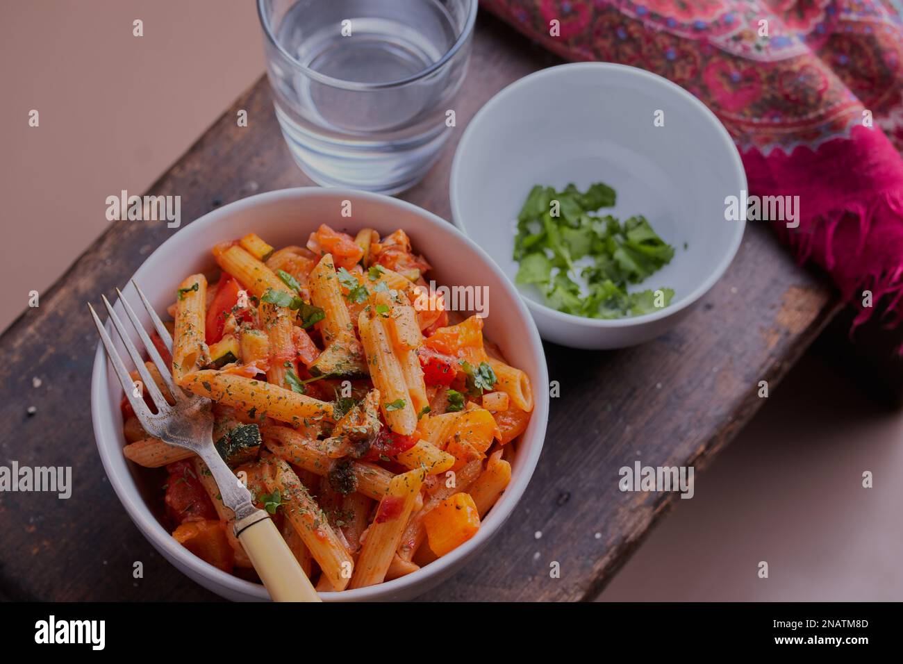 Fish and pasta dish with vegetables shot from above. Stock Photo