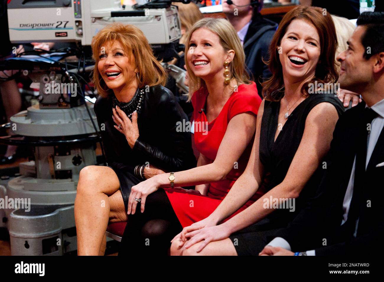 Regis wife, Joy Philbin, left, and his daughters, sit in the audience during Regis farewell episode of