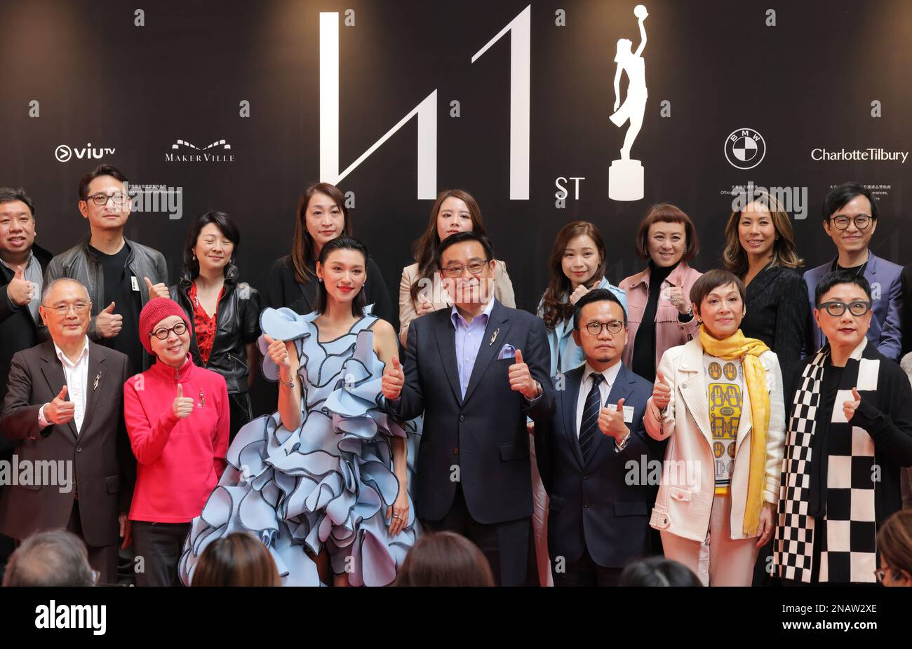 Derek Yee Tung-sing (middle), Chairman of Hong Kong Film Awards Association, Board of Directors; actress Louise Wong (front, third from left) and industry members attend the press conference of 'The 41st Hong Kong Film Awards' at Hong Kong Cultural Centre in Tsim Sha Tsui. 09FEB23  SCMP / Jelly Tse Stock Photo