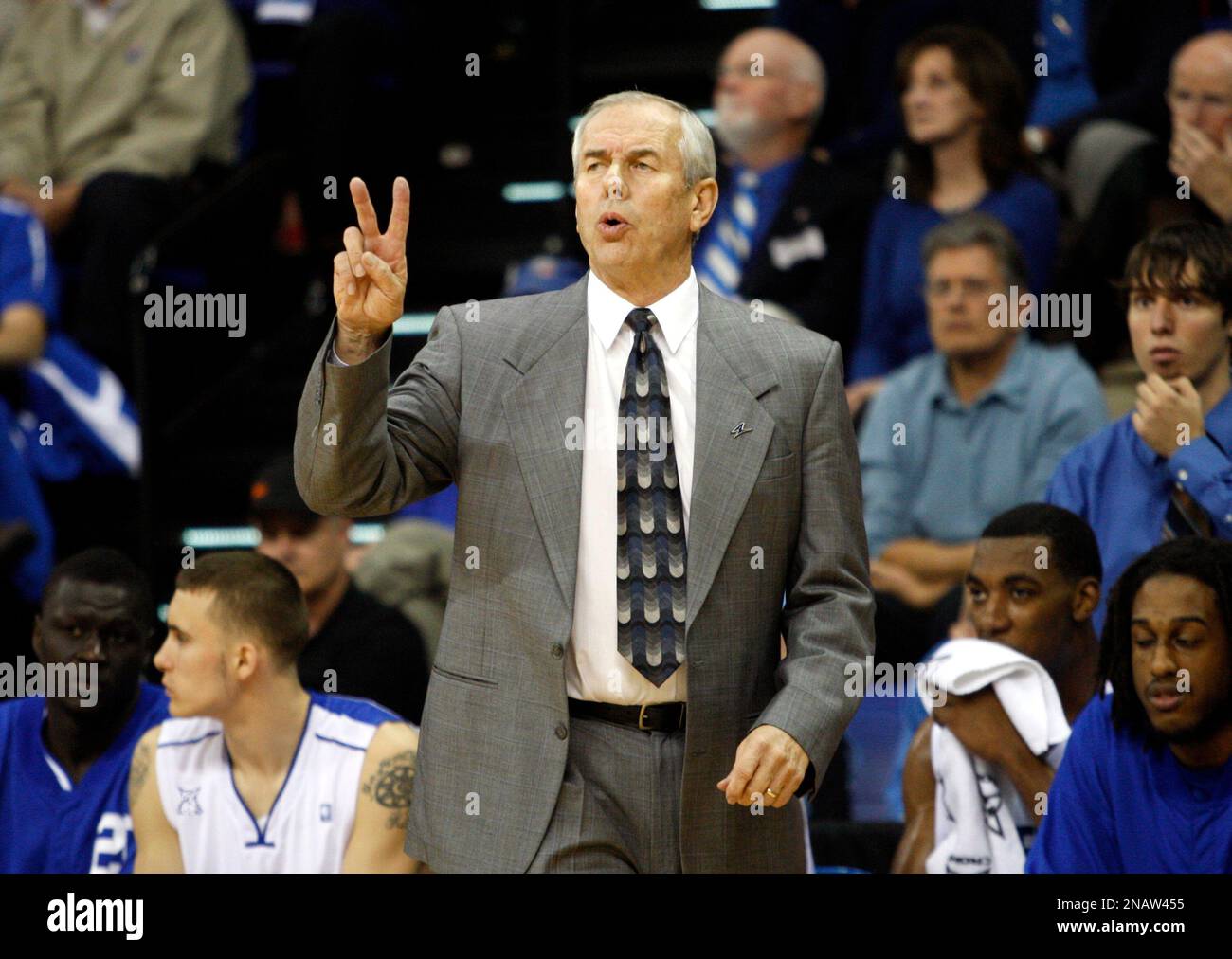UNC Asheville basketball coach Eddie Biedenbach calls a play as his