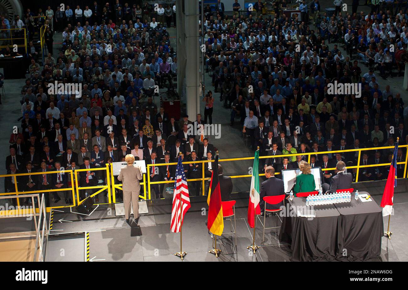Siemens employees watch NC governor Beverly Perdue, at podium, speak ...