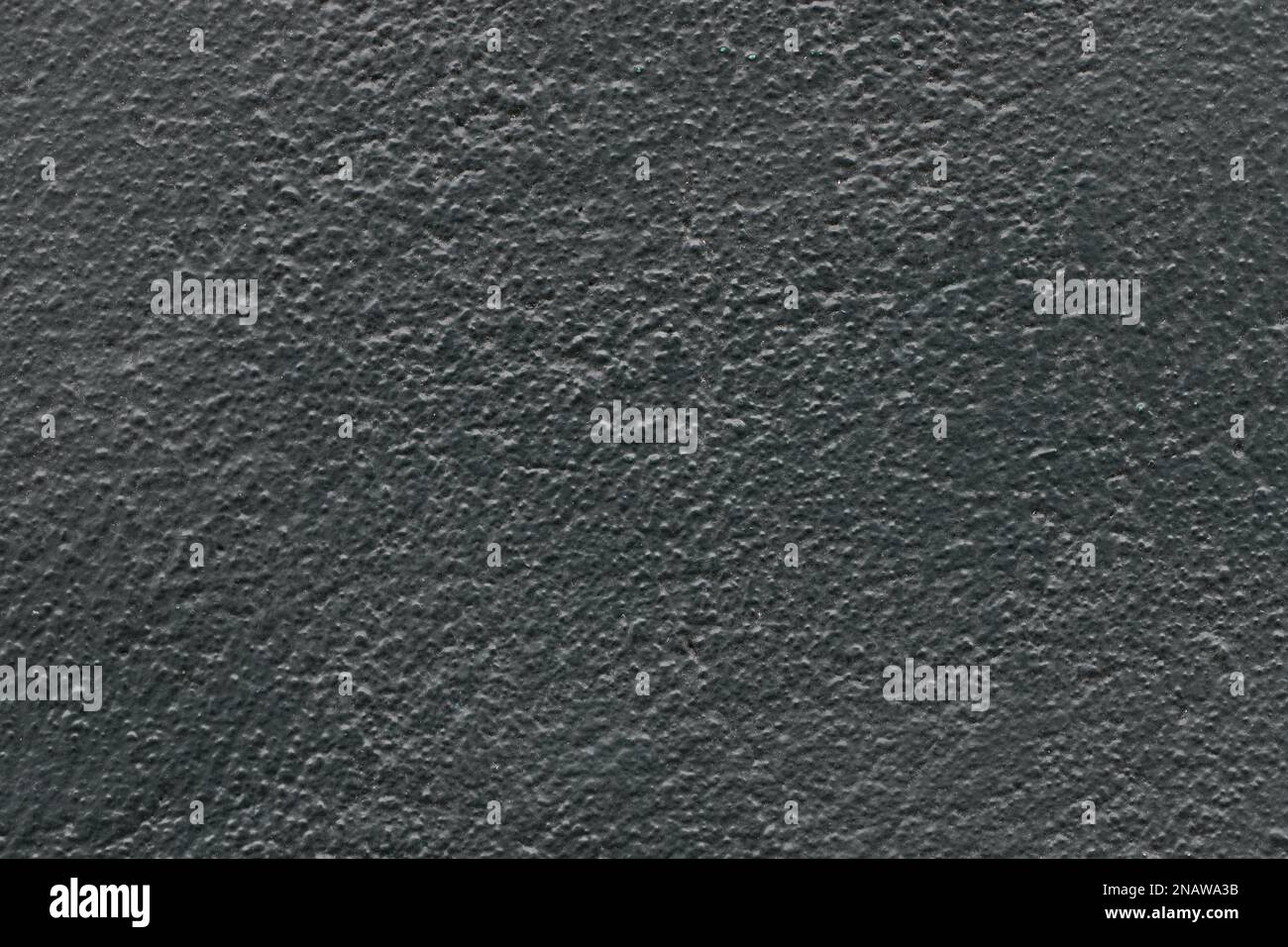 Abstract dark gray painted stone uneven texture, black wall background Stock Photo