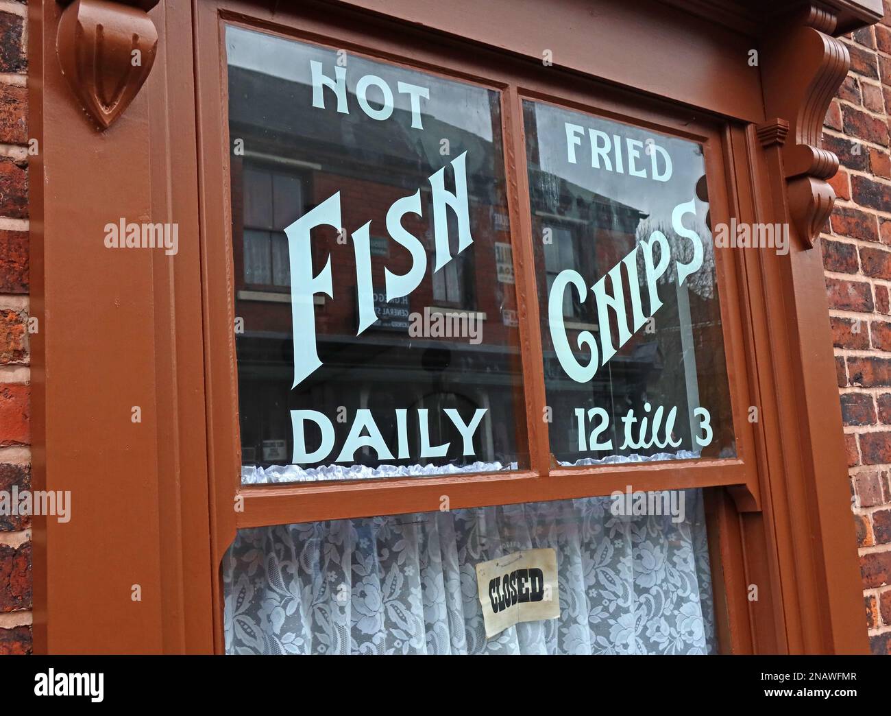 The British national dish, traditional hot fried Fish & chips daily Stock Photo