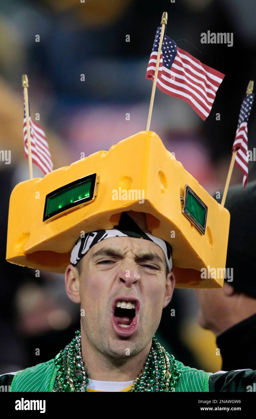 a-fan-cheers-before-an-nfl-football-game-between-the-green-bay-packers