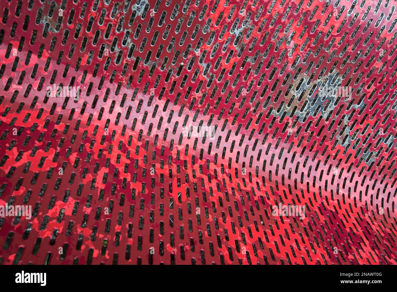 Worn red paint on metal seat hi-res stock photography and images - Alamy