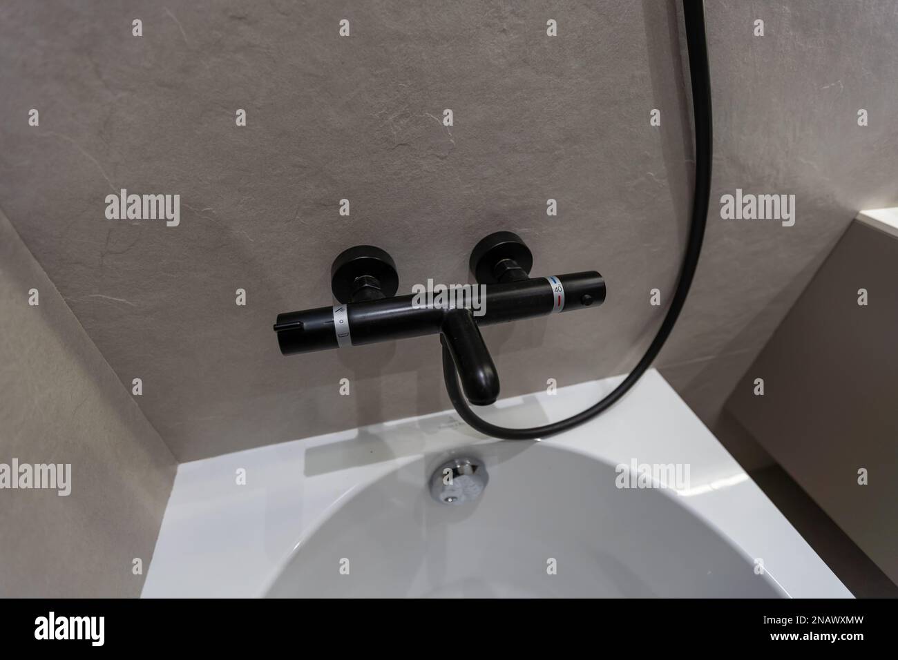 black fittings in the bathroom white background Stock Photo Alamy