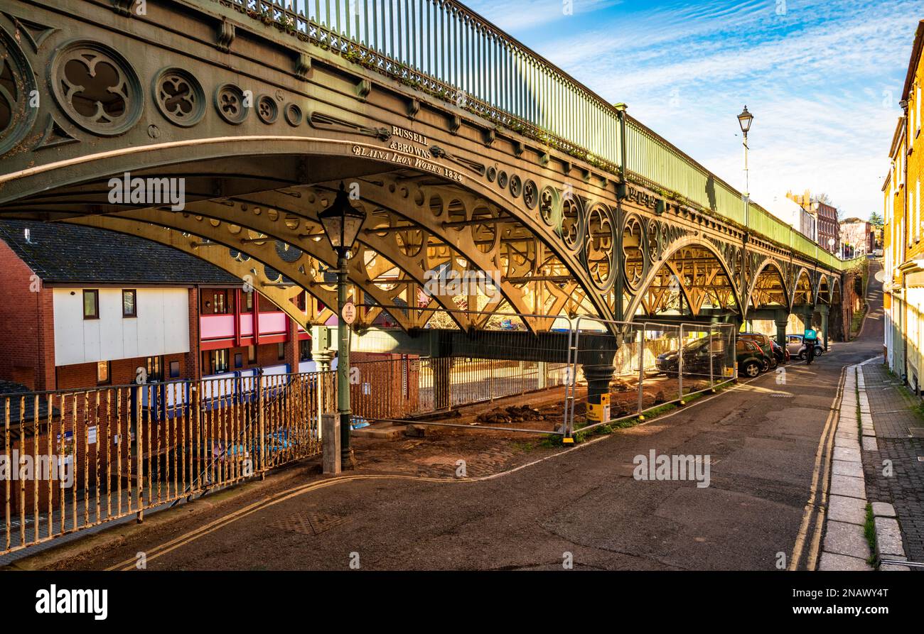 The Iron Bridge was commissioned in 1834 to cross the steep-sided Longbrook Valley, providing an improved approach to the city. Stock Photo