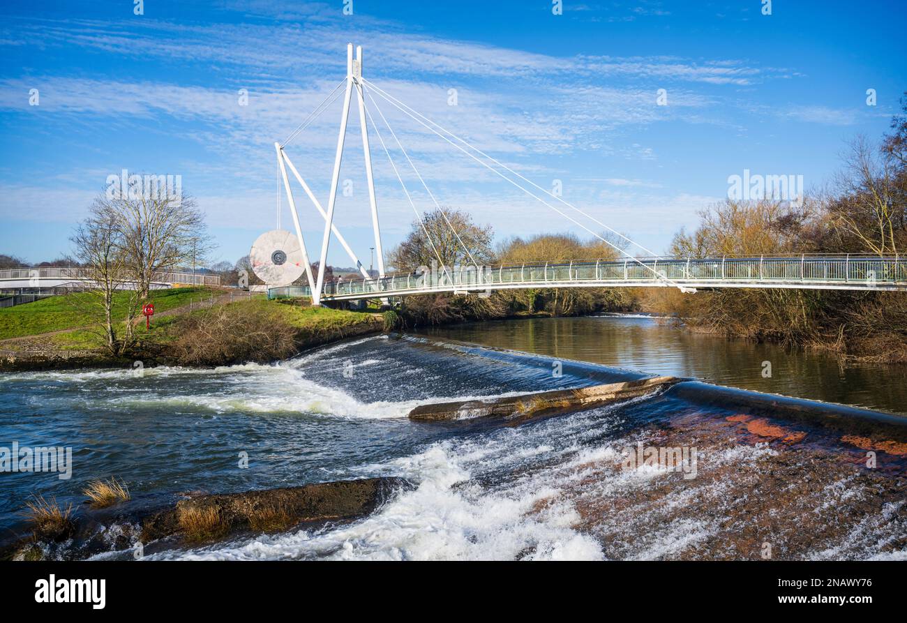Millers Crossing Bridge is an important pedestrian link across the River Exe between Bonhay Road and Exwick playing fields.  Exeter, Devon, UK Stock Photo