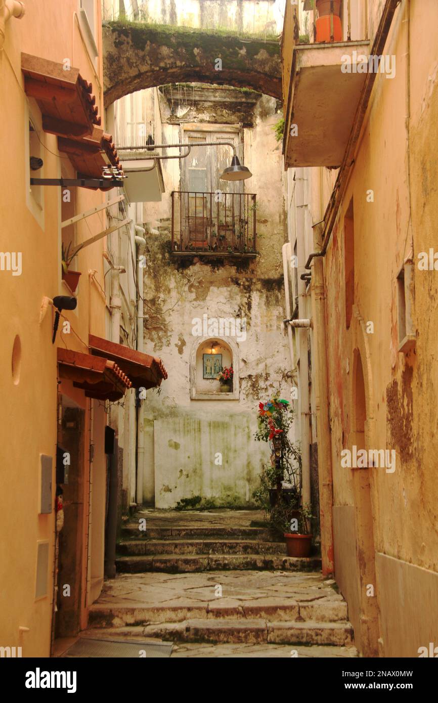 Gaeta, Italy. Narrow unkempt alleyway between residential buildings in