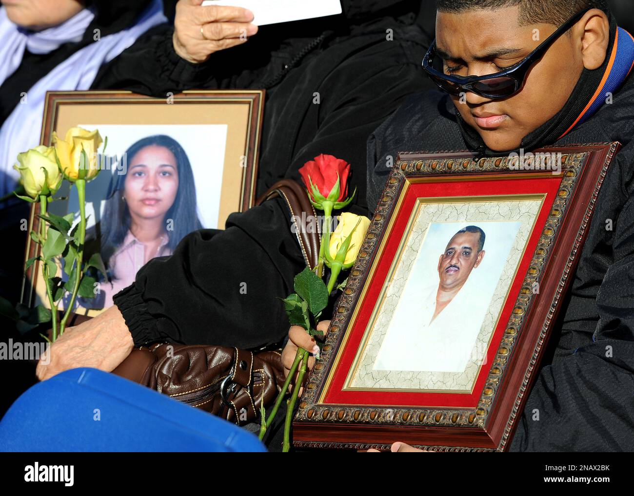 Photographs of loved ones that were killed in the American Airlines ...