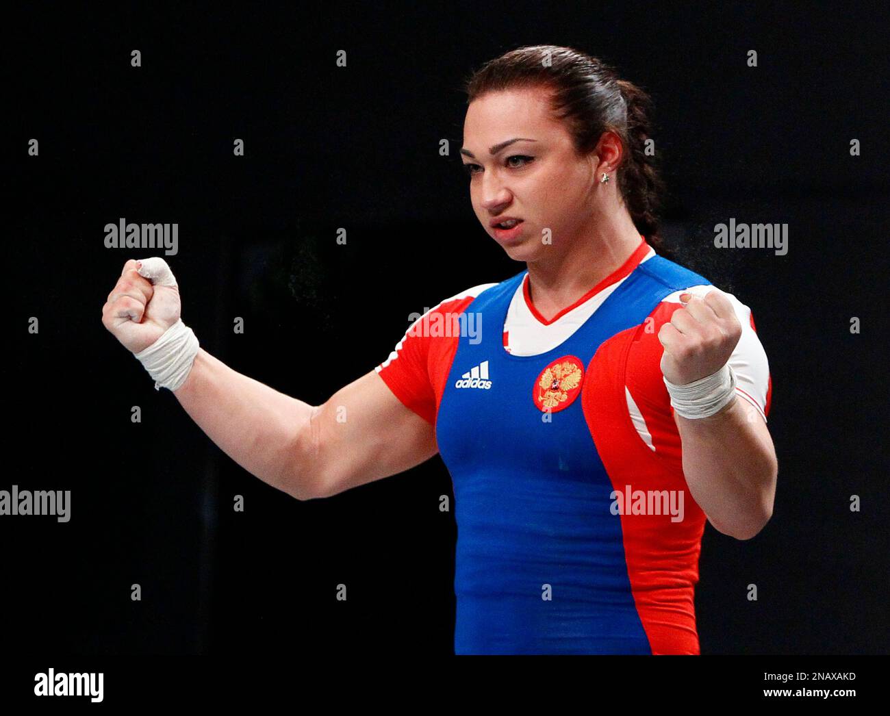 Nadezda Evstyukhina from Russia reacts as she competes in the snatch of the  Women's 75kg category at the World Weightlifting Championships, in Paris,  Thursday Nov. 10, 2011. (AP Photo/Francois Mori Stock Photo -