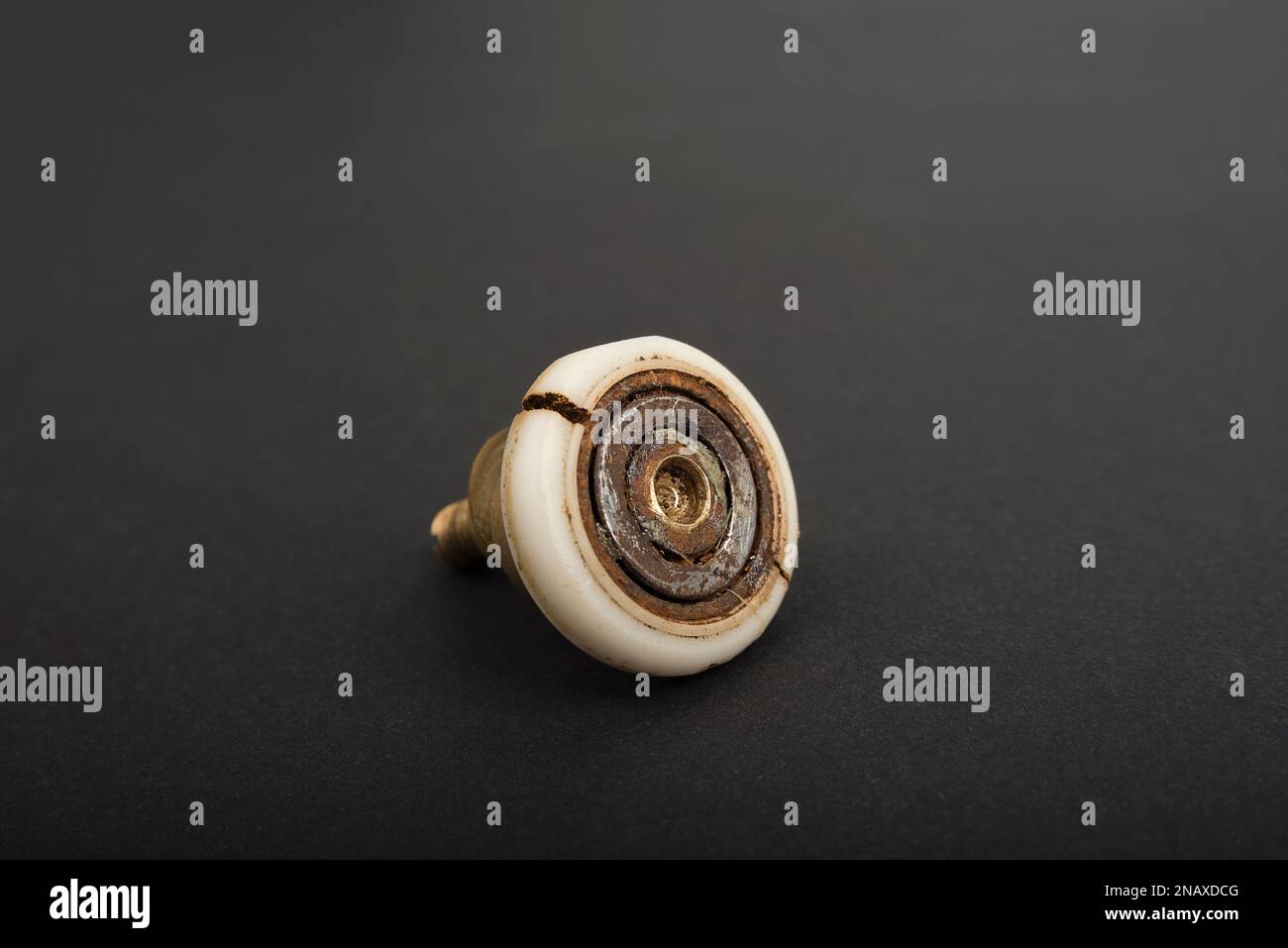 Rusty broken shower door roller. Maintenance concept Stock Photo Alamy