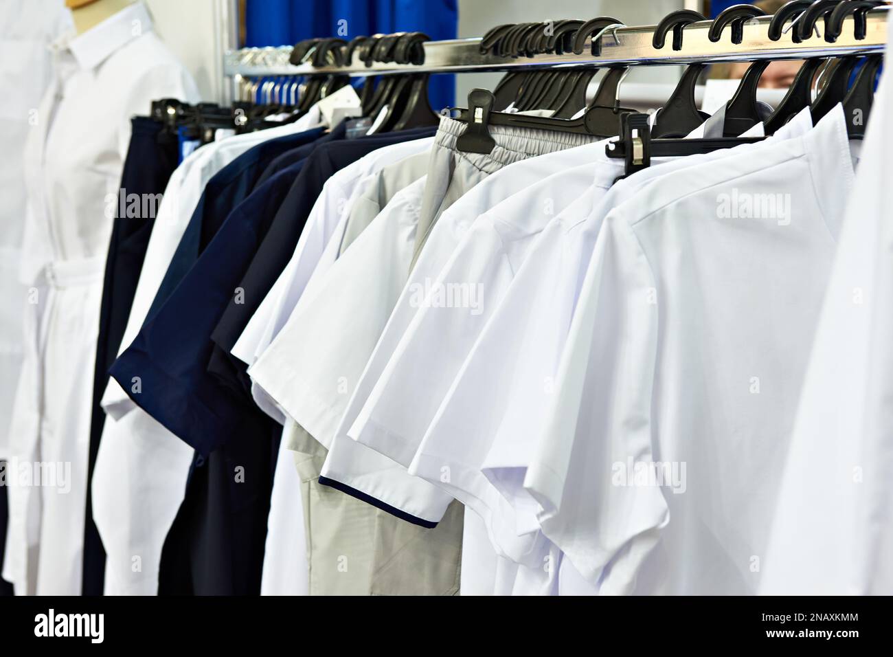 Clothes for doctors in the store at the exhibition Stock Photo Alamy