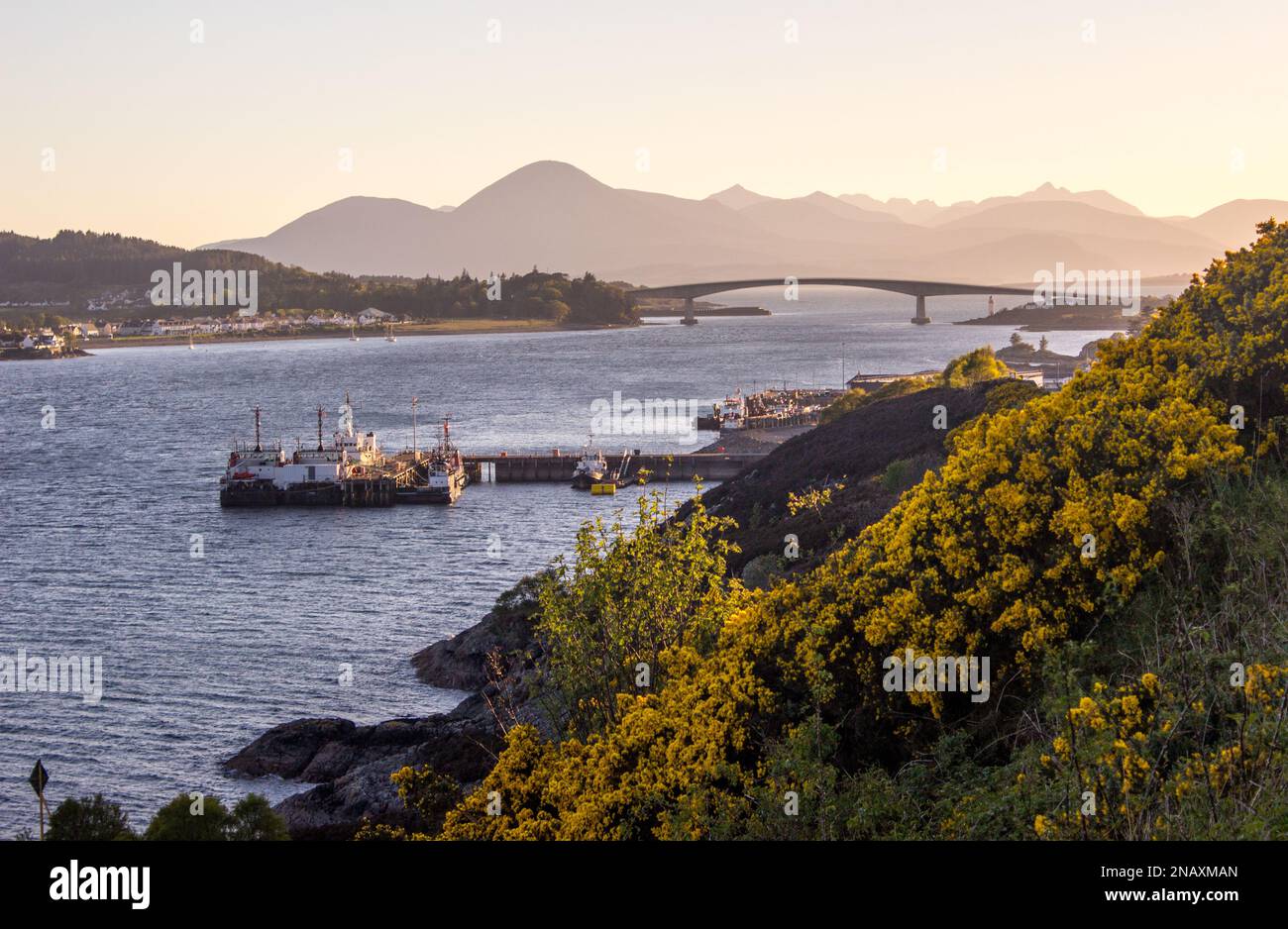 The Kyle of Lochalsh and the Isle of Skye at dawn, with the Skye Bridge in the background Stock Photo
