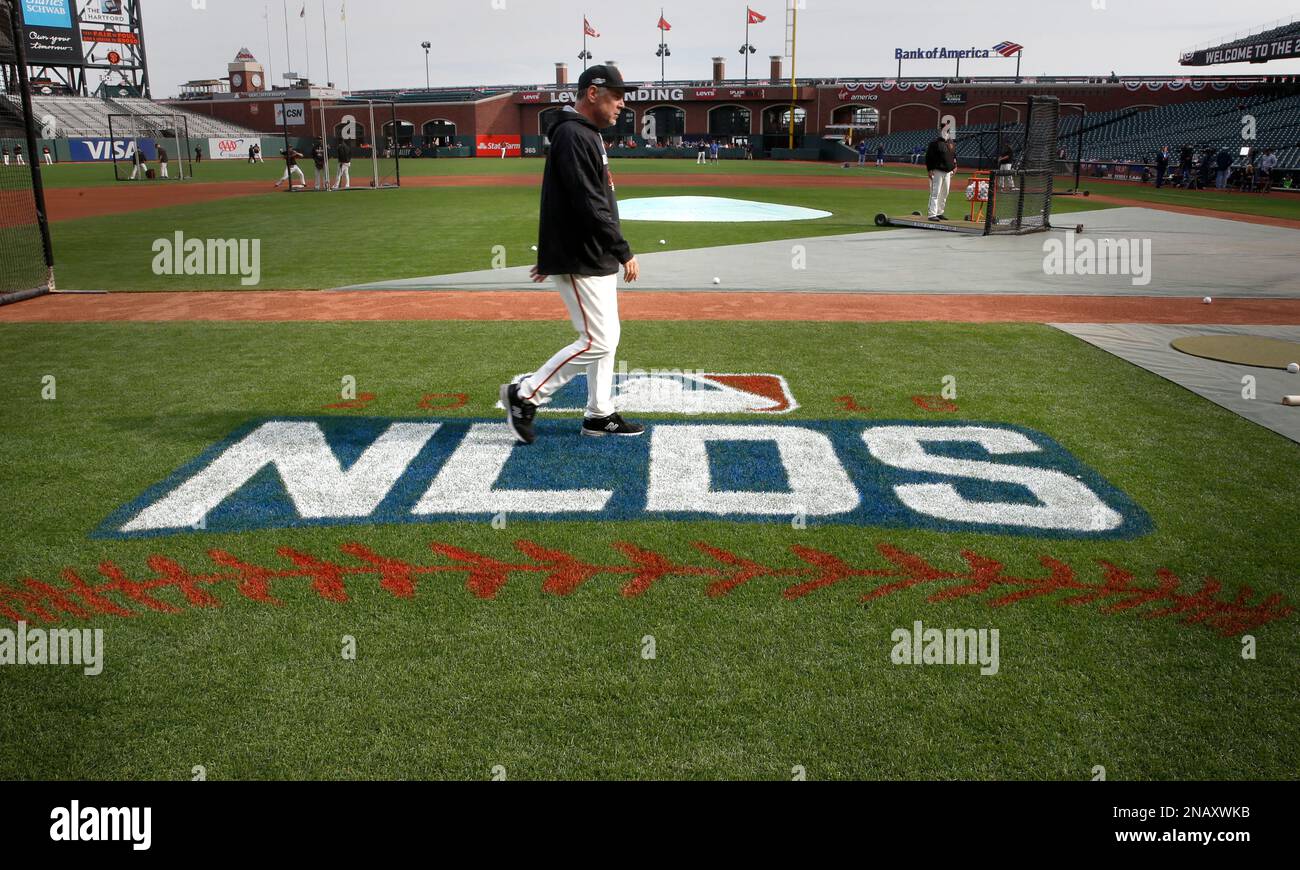 San Francisco Giants manager Bruce Bochy heads to the Visiting Clubhouse  after leaving the field at Rangers Ballpark after the San Francisco Giants  win Game 5 of the World Series over the