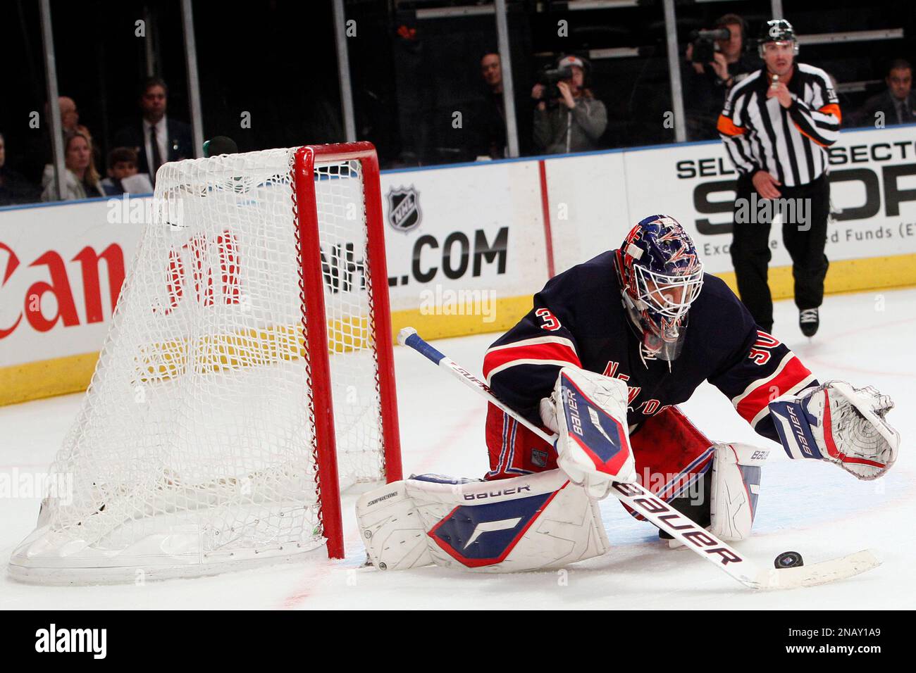 New York Rangers' Henrik Lundqvist, of Sweden, defends the net during ...