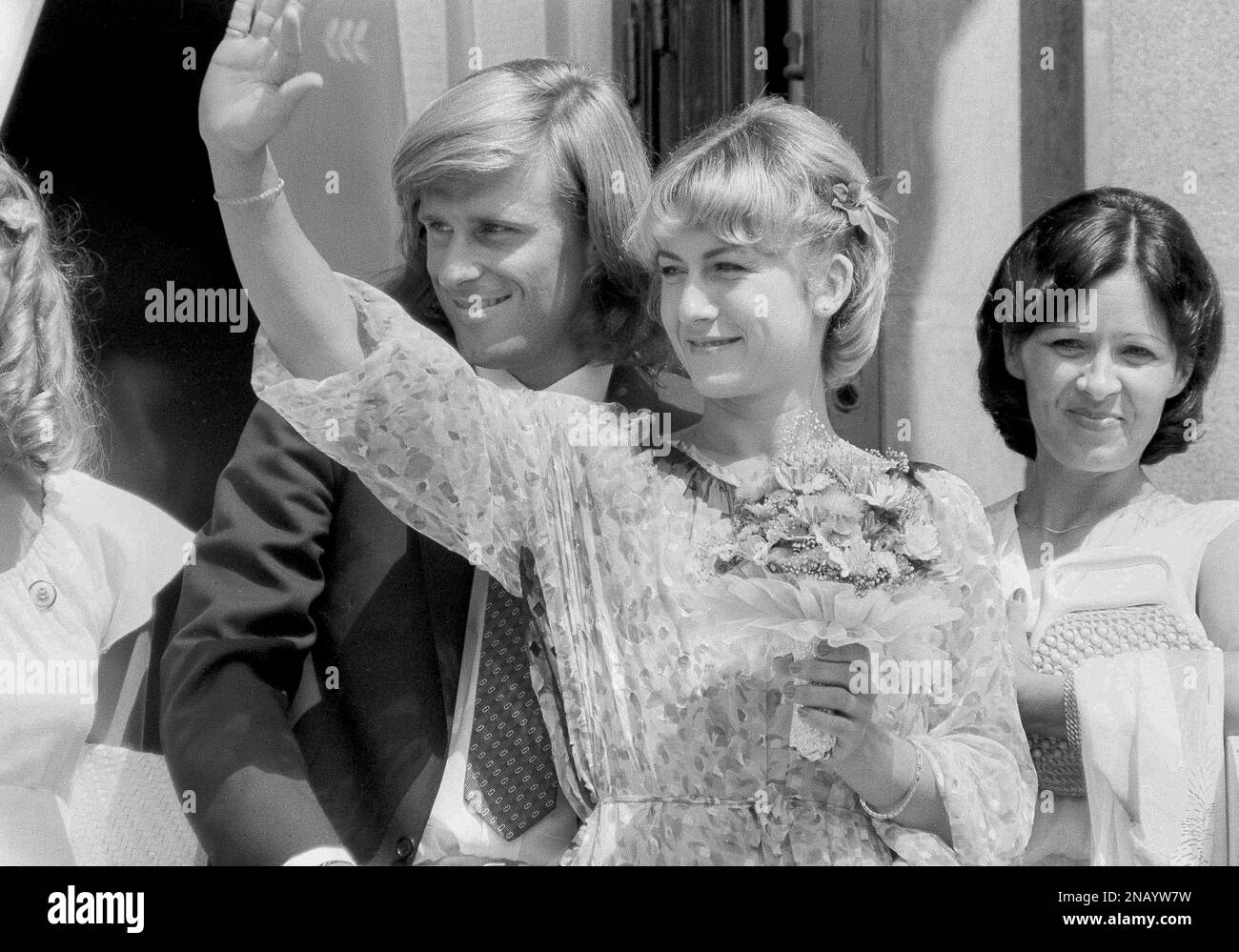 Swedish tennis ace Bjorn Borg and his Romanian bride Mariana Simionescu are  all smiles from the balcony of the registry office at the municipal hall in  Bucharest after their civil wedding ceremony