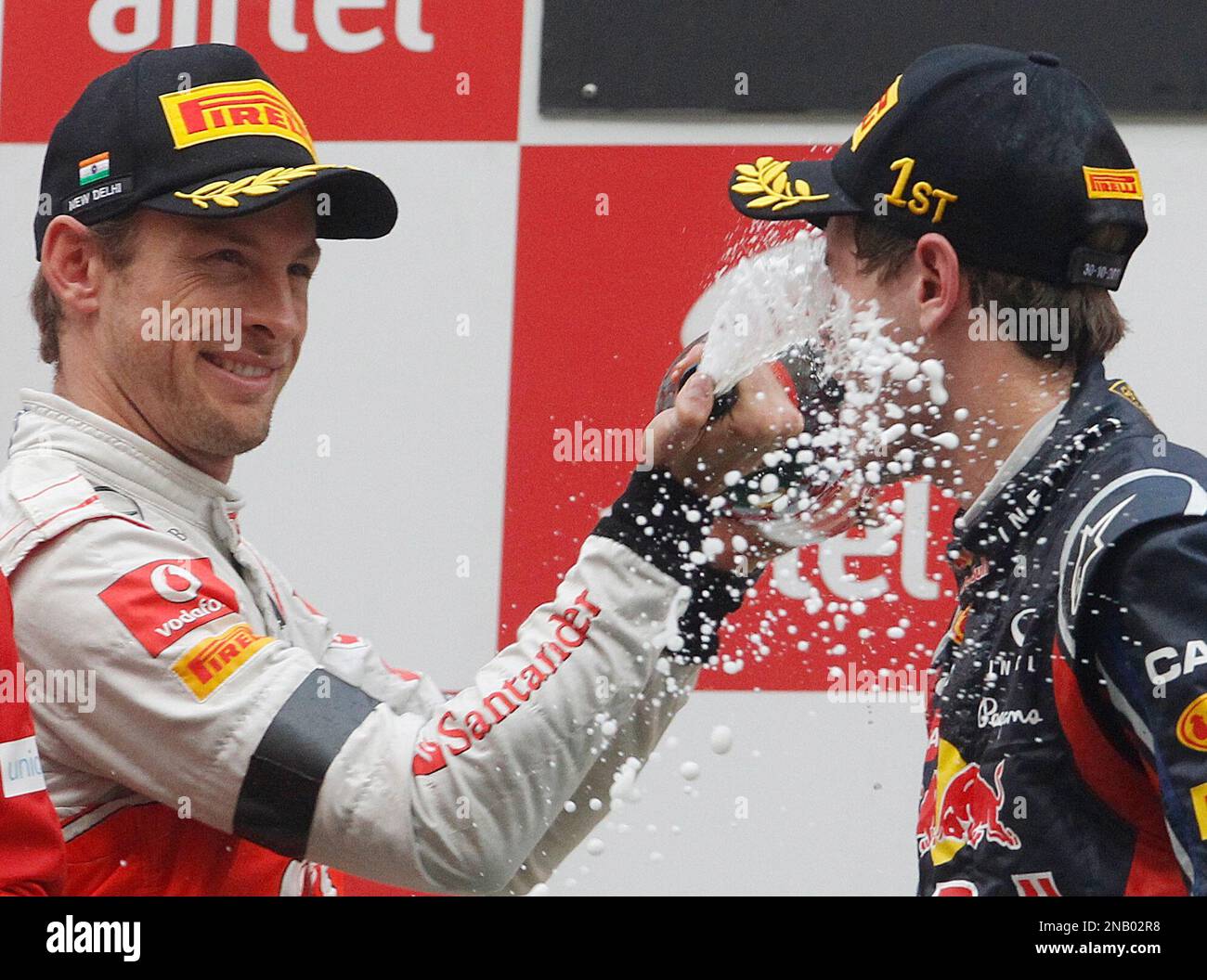 Red Bull driver Sebastian Vettel of Germany, left , winner, and McLaren ...
