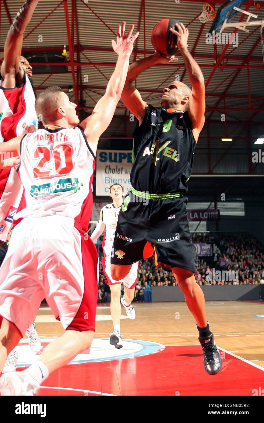 ASVEL's Tony Parker of France shoots at a basket against Cholet's Donnie  McGrath during their French ProA basketball match in Cholet, western France  France, Saturday, Oct. 29, 2011. Vice President of the