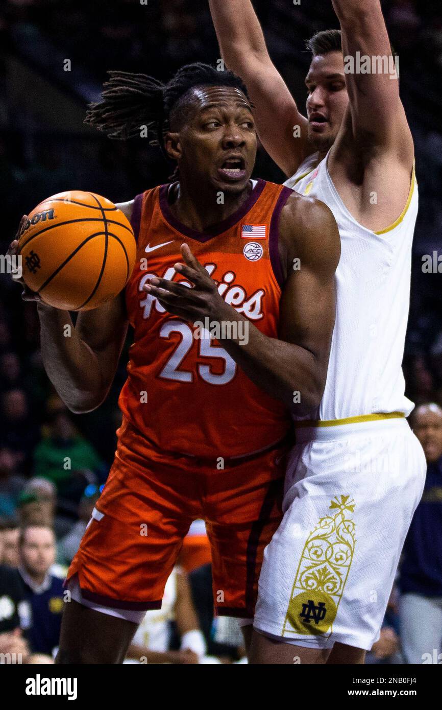 Virginia Tech's Justyn Mutts (25) looks to pass as Notre Dame's Nate