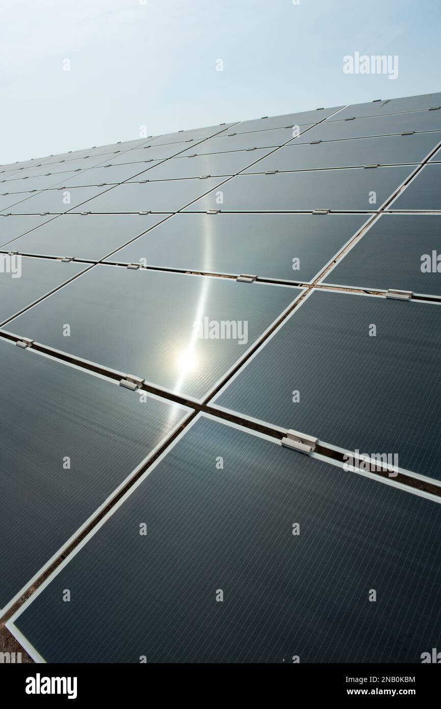 A solar cell panel, solar electric panel, photo-voltaic module, PV panel or solar panel assembly of photovoltaic solar cells mounted in a rectangular Stock Photo