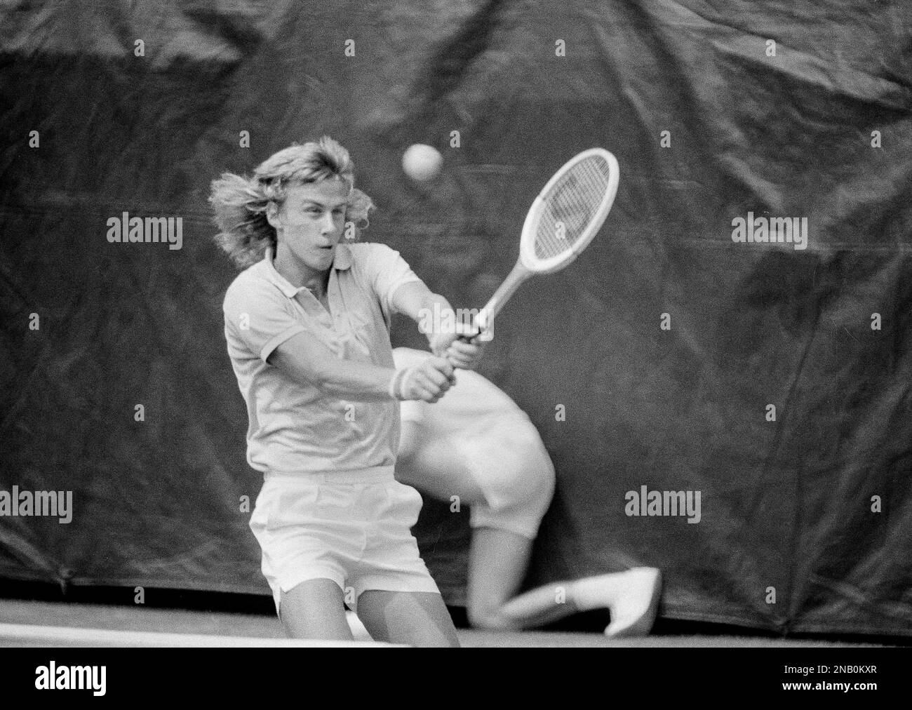 Bjorn Borg, 17, of Sweden, shows off his two-fisted backhand during a ...