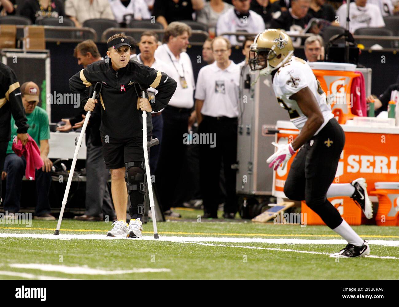 New Orleans Saints' head coach Sean Payton on crutches before an NFL football game between the New Orleans Saints and the Indianapolis Colts at the Superdome in New Orleans, Sunday, Oct. 23, 2011. (AP Photo/Jonathan Bachman) Stock Photo