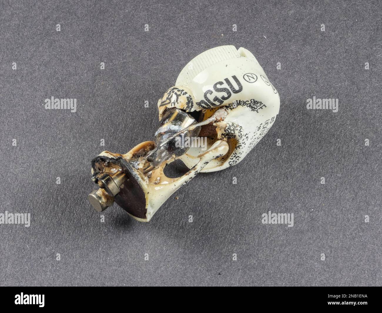 A severely blown starter fuse from a fluorescent light unit in the UK Stock  Photo - Alamy