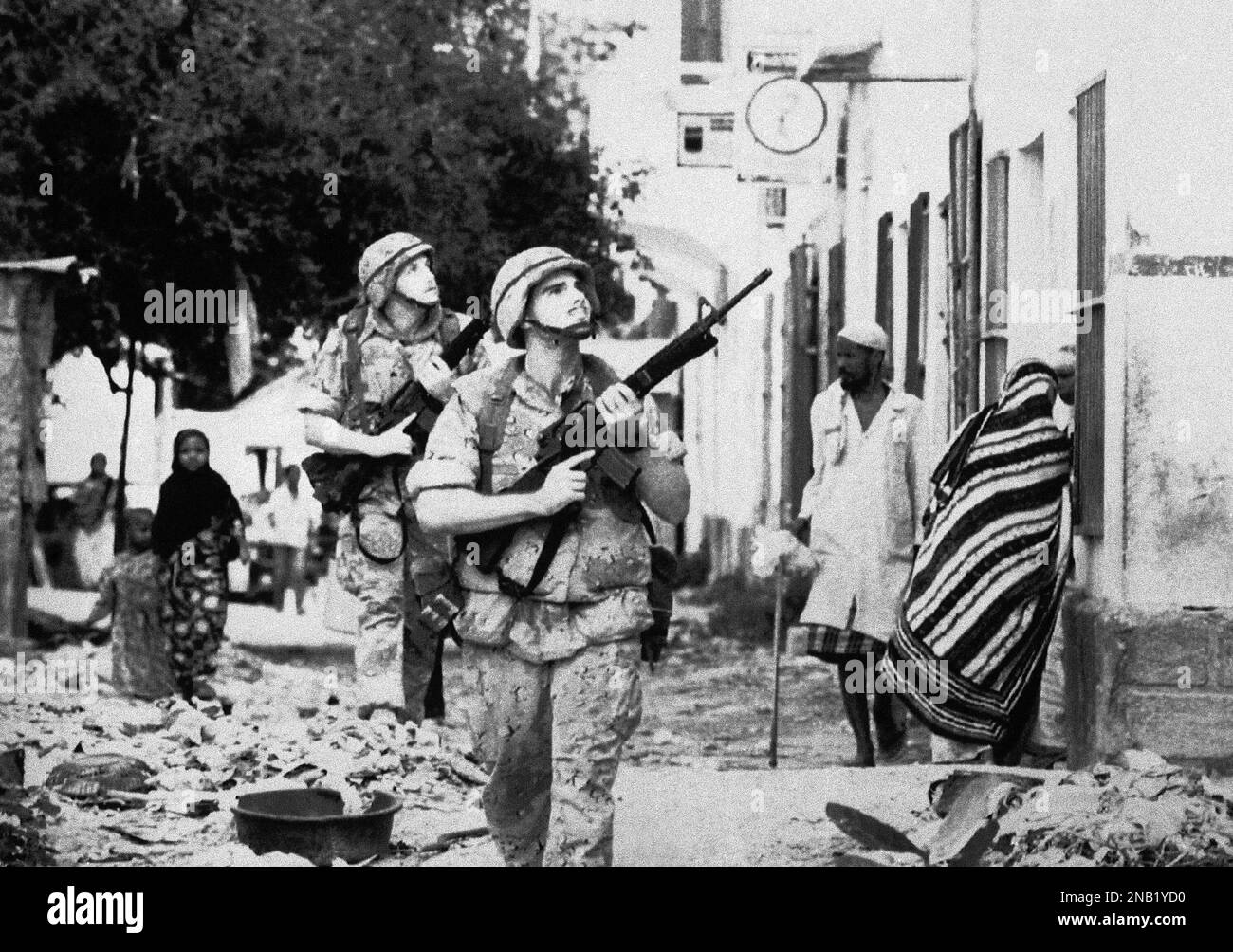 U.S. Marines sweep through Mogadishu’s ‘green line’ district on Jan. 13 ...