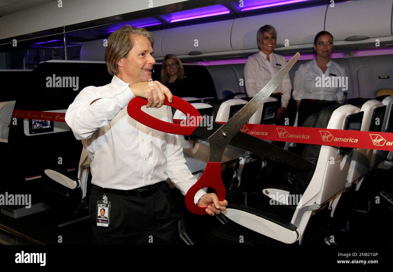 Virgin President and CEO David Cush Virgin is shown in front of a ...