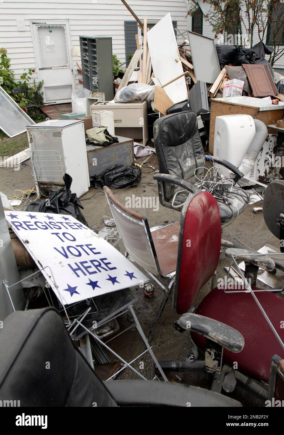 In this Sept. 8, 2011 photo, the flooddamaged contents of the town