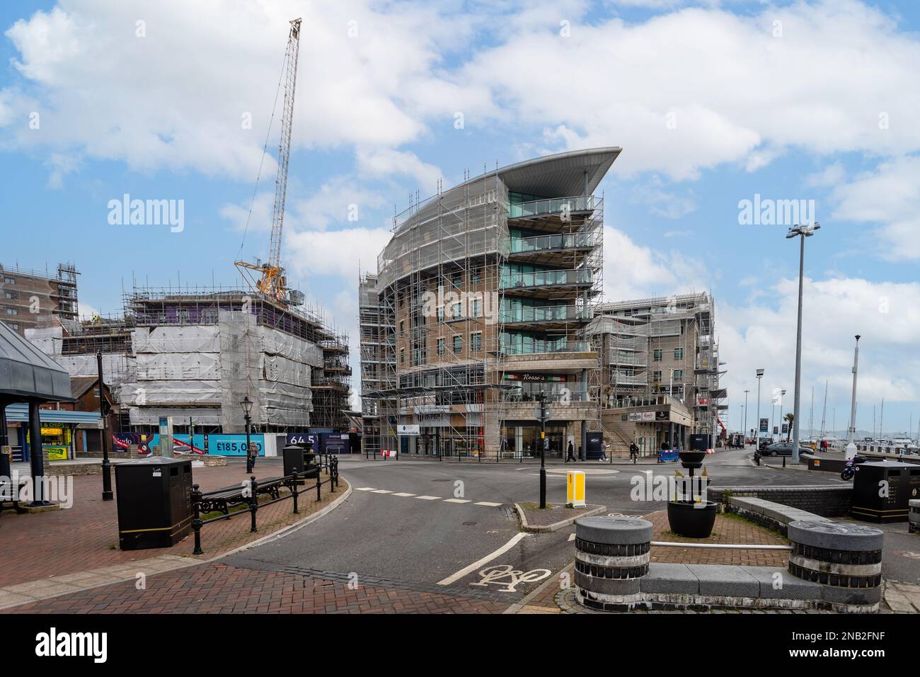 Apartment blocks in Poole harbour having their cladding replaced following Grenfell Tower disaster in Poole, Dorset, UK on 13 February 2023 Stock Photo