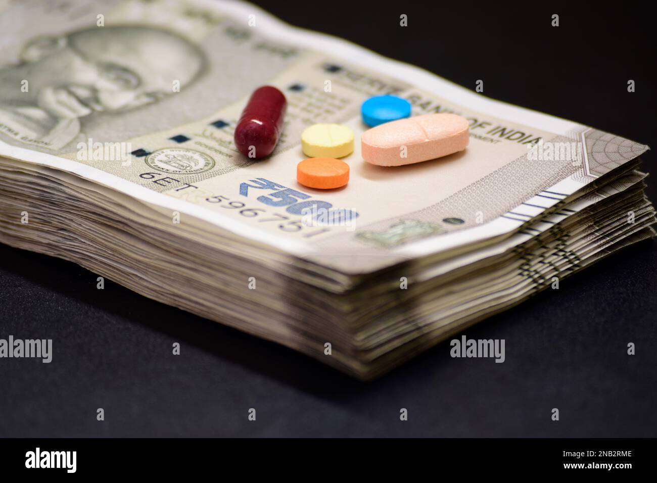 Medicine with indian currency, pharmacy business and costly medicine concept Stock Photo