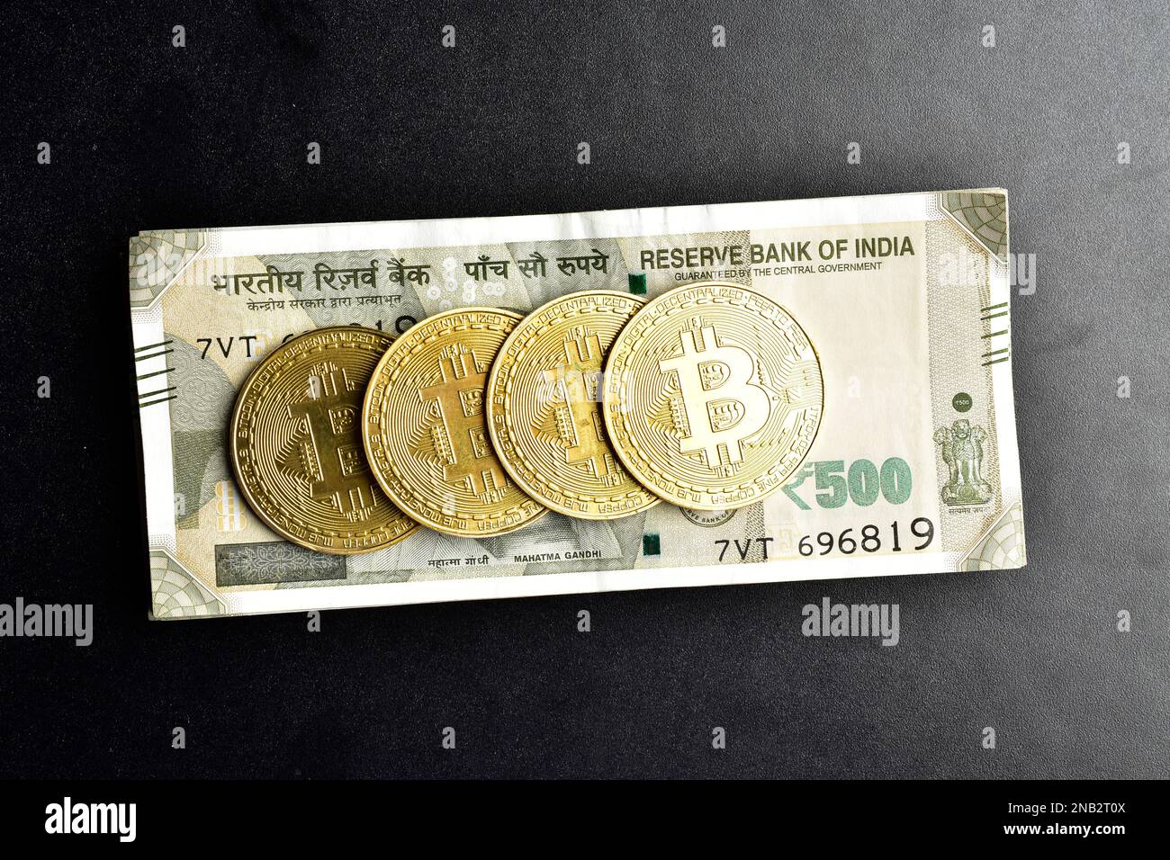 Top view of indian currency with bitcoin, cryptocurrency india concept  Stock Photo - Alamy