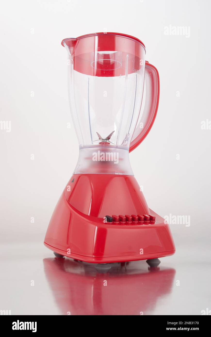 Household appliance - red electric blender. Stock Photo