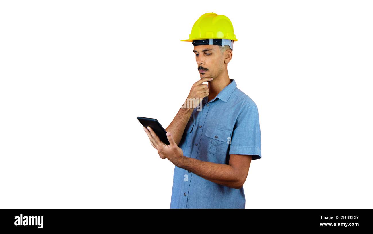 Engineer Holding Mobile isolated on Orange. Stock Photo