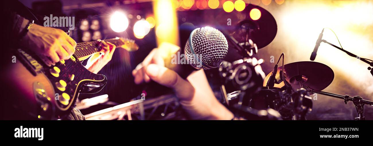 Music entertainment and festival events.Band on stage. Recreation and music show.Live rock music and jazz music background. Stock Photo