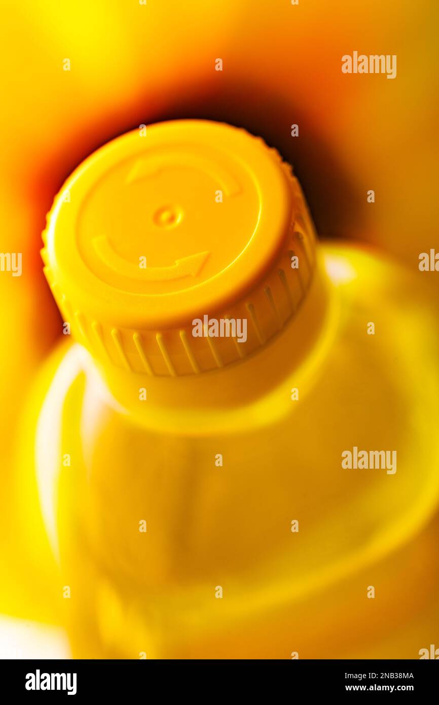 Plastic bottle and cooking oil recycling concept.Detail of sunflower