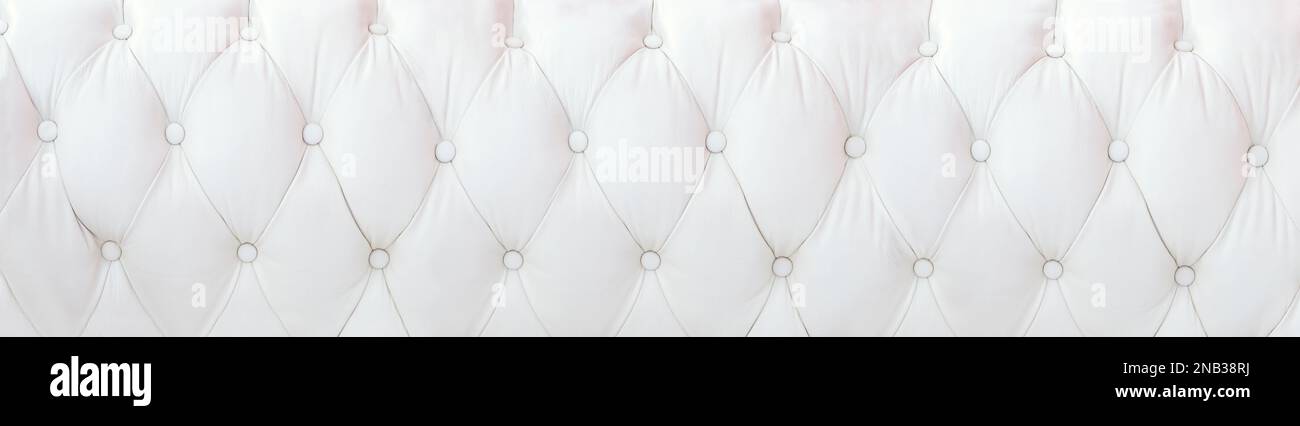 White leather upholstery background in widescreen format Stock Photo
