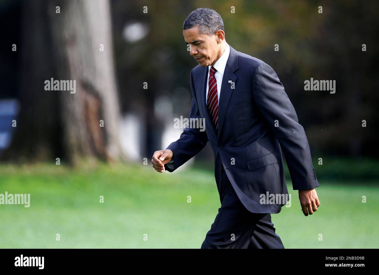 Obama Walter Reed President Barack Obama walks on the South Lawn at the White House in ...