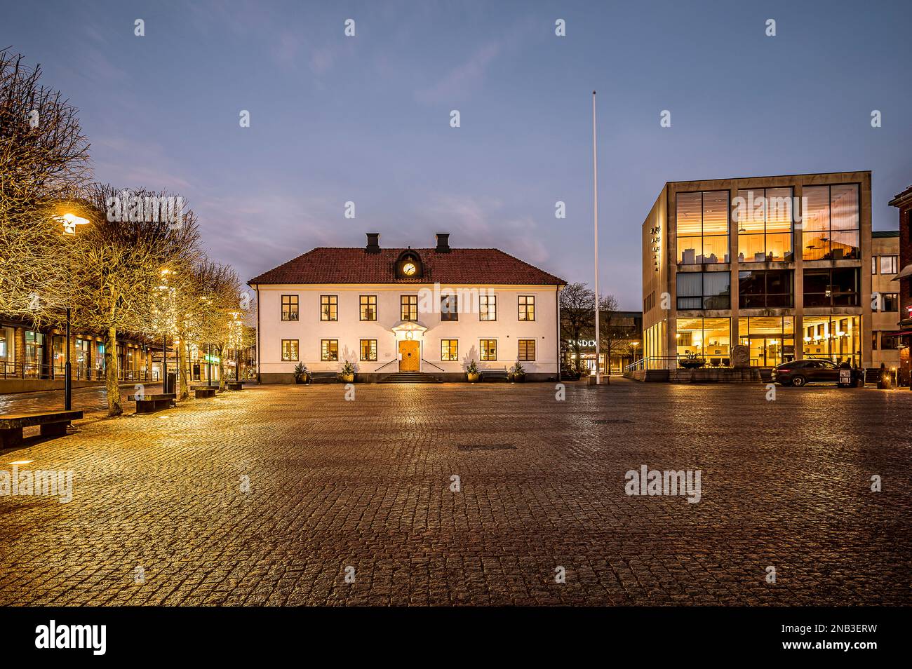 the square and old Town hall in Falkenberg at night, Sweden, February 11, 2023 Stock Photo
