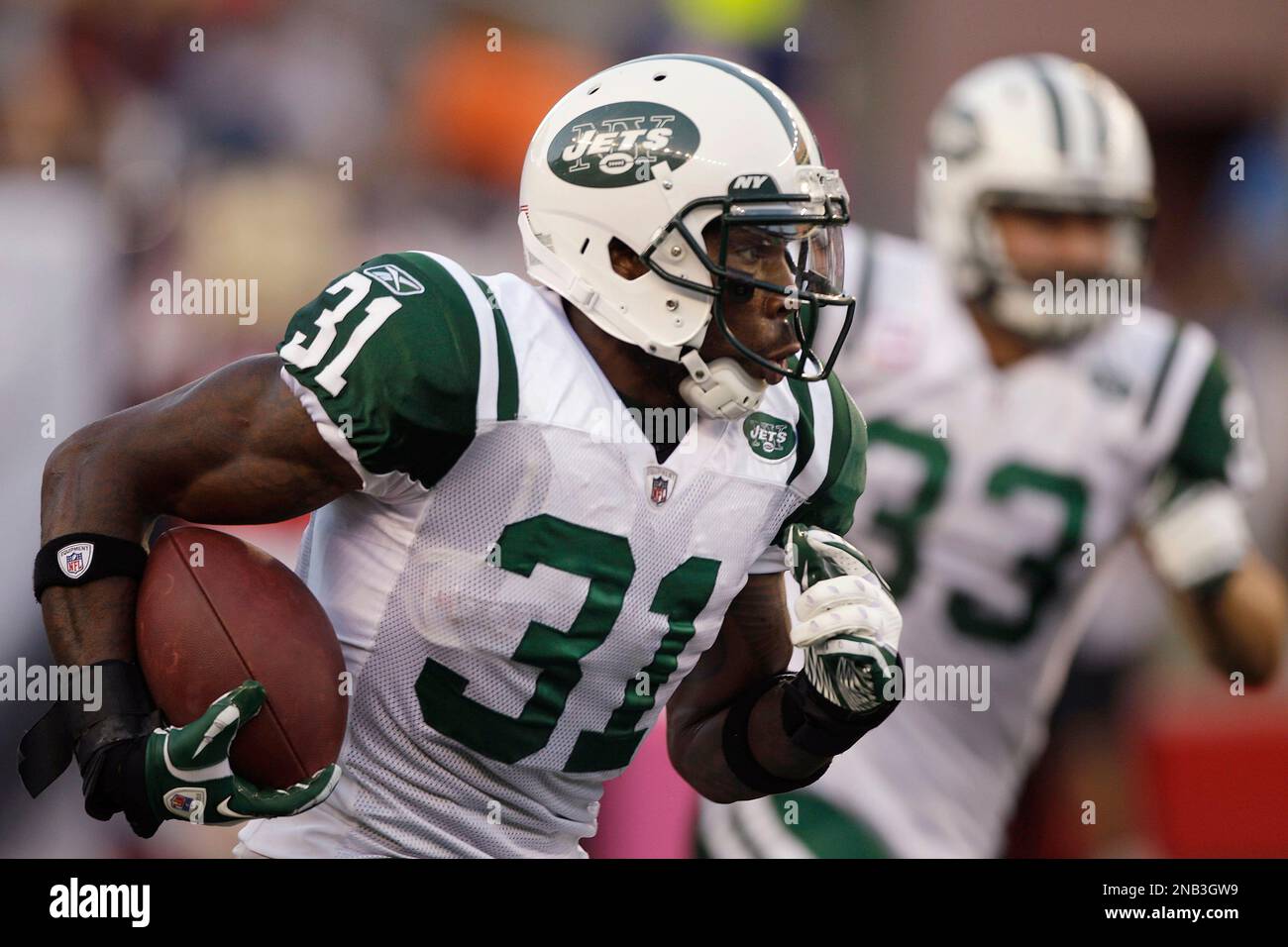 New York Jets cornerback Antonio Cromartie (31) heads up field with an interception of a pass by