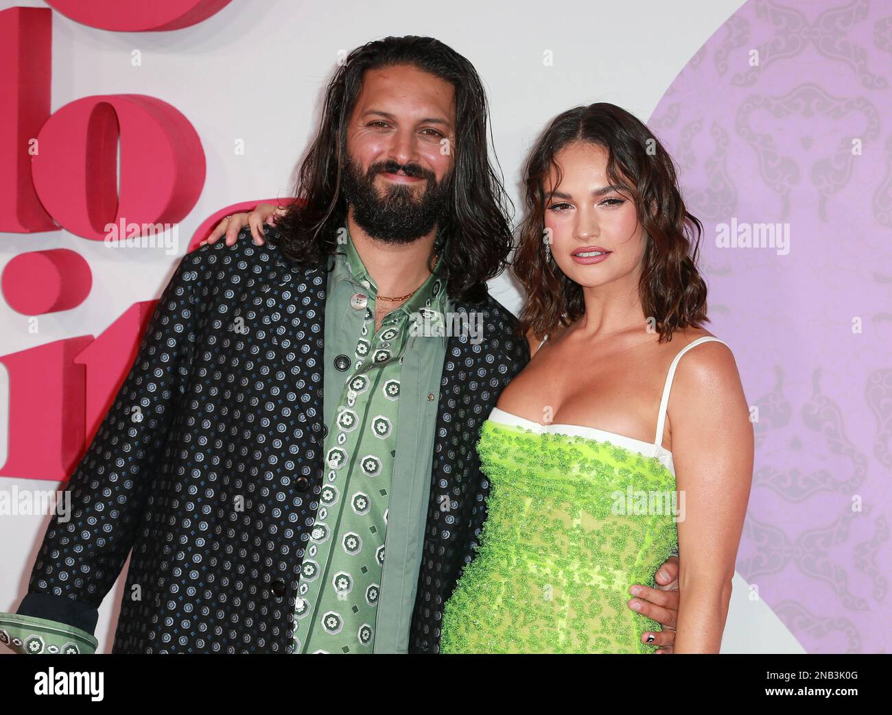 Shazad Latif and Lily James attend the UK Premiere of "What's Love Got