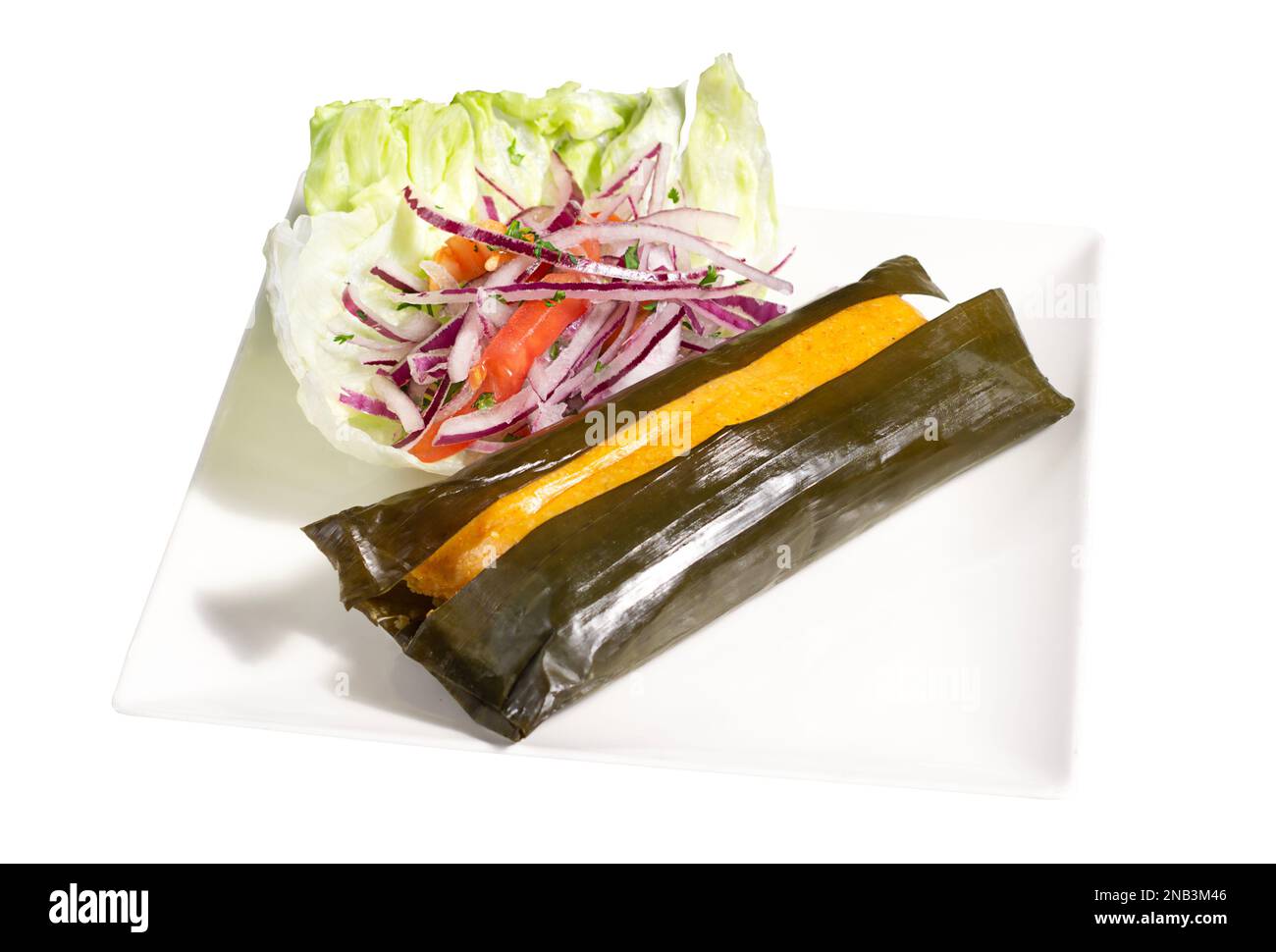 Peruvian traditional food. Tamal with a green salad Stock Photo Alamy
