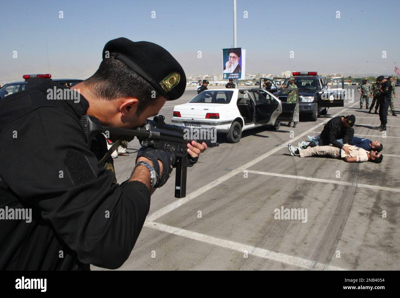 Members of Iranian police special forces perform a scenario of police