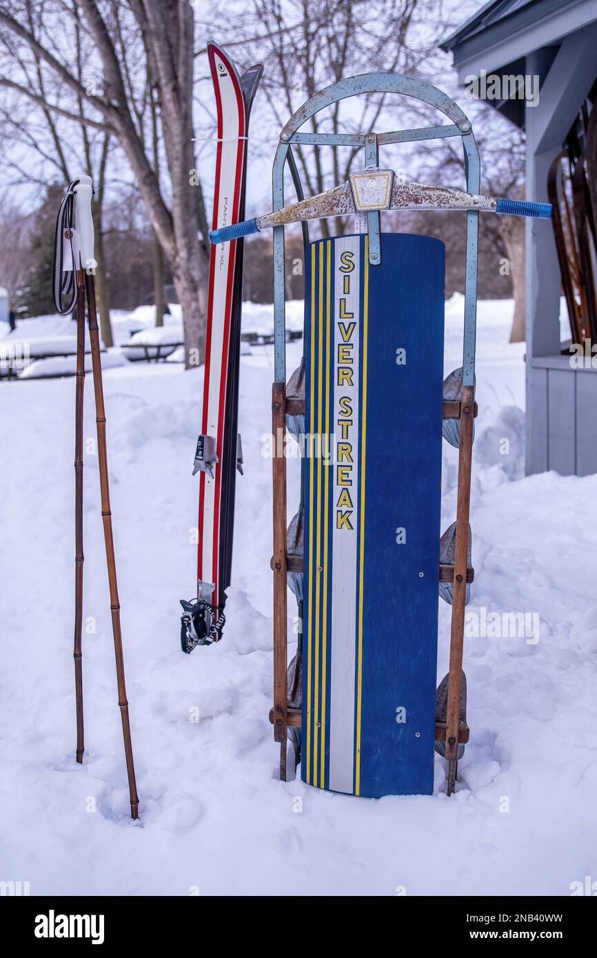 Vintage Silver Streak sled, skis and poles at the 18th Annual Vinterfest at the Gammelgarden Museum in Scandia, Minnesota USA. Stock Photo