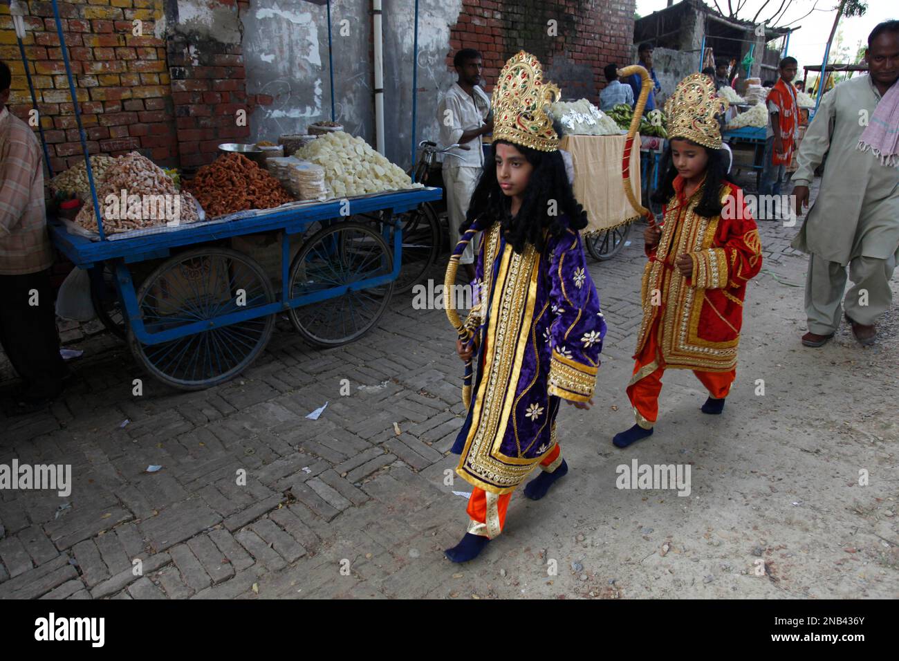 Indian child artists dressed as Hindu god Rama, right, and his brother ...