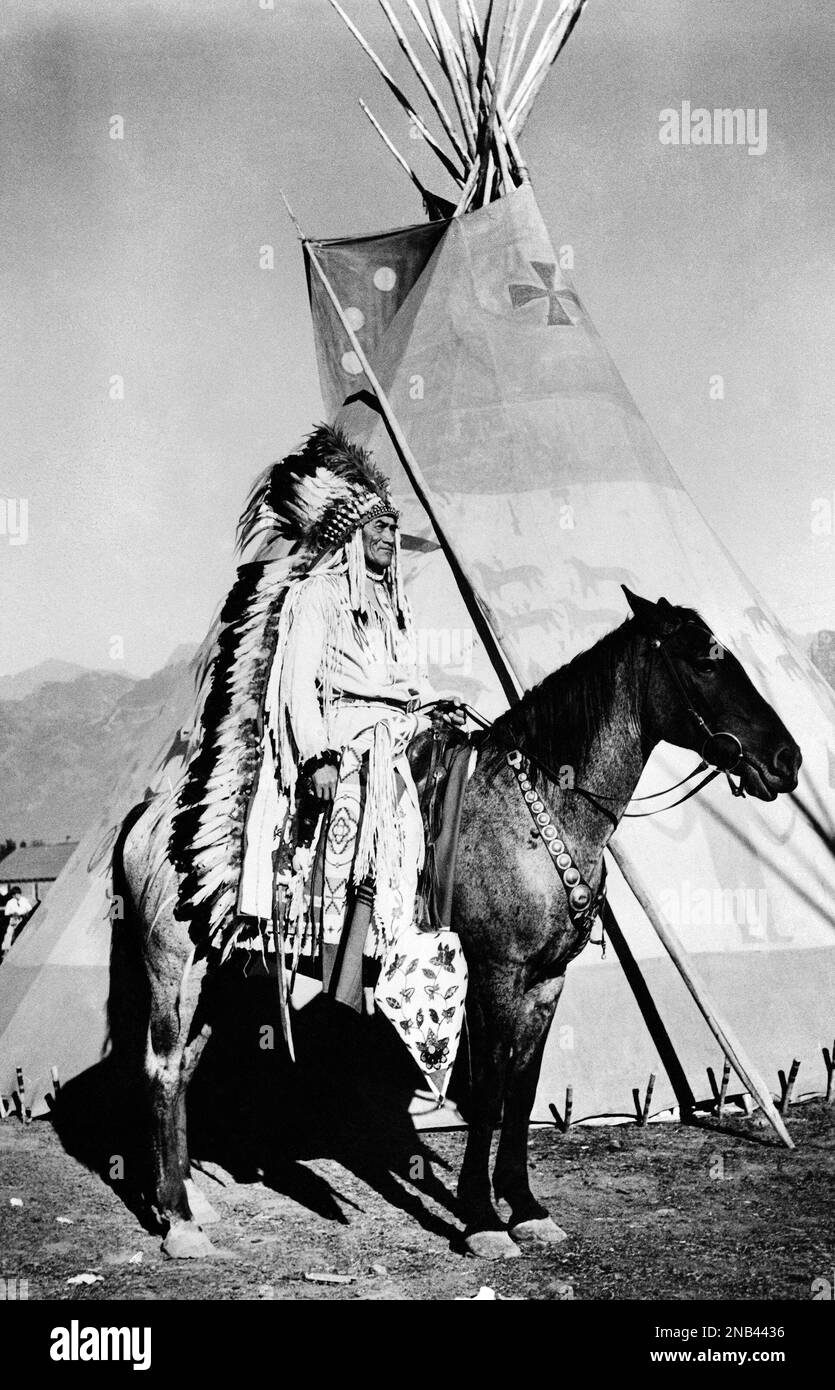 Eagle Ribs, chieftain of the Blackfoot tribe of Indians, on pony in