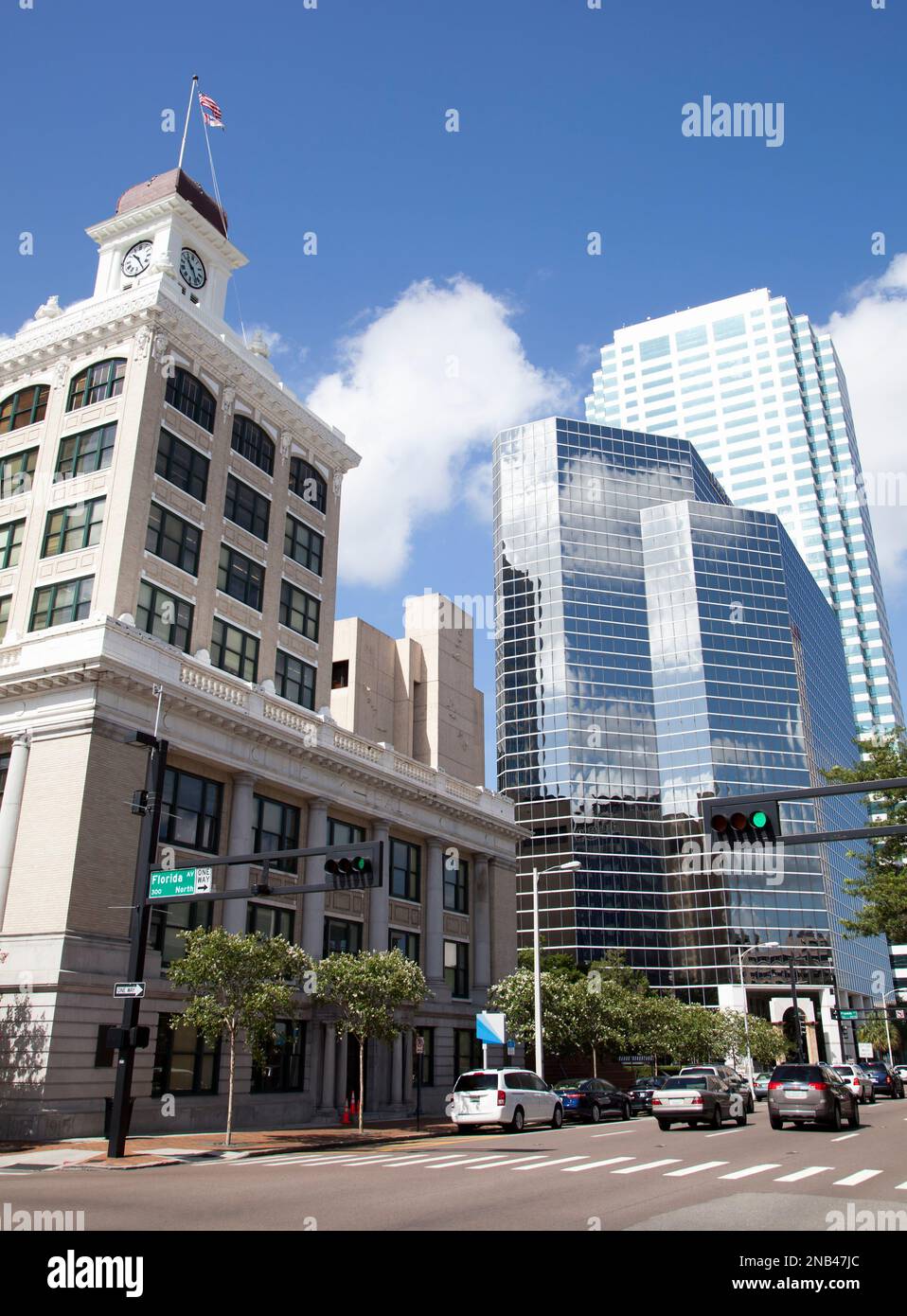 The view of historic Tampa city hall and modern glass covered skyscrapers in a background (Florida). Stock Photo