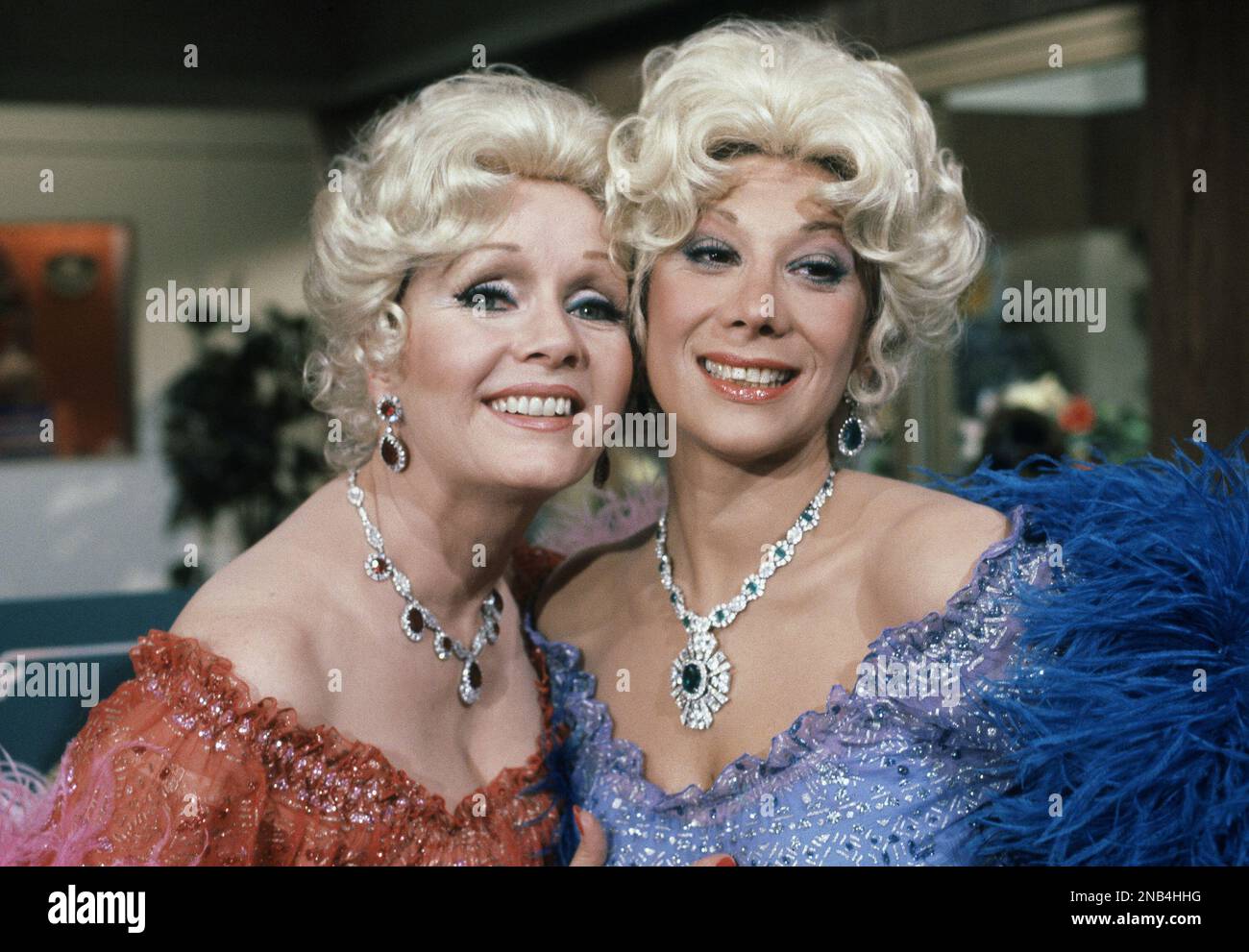 Actress Debbie Reynolds (red dress) and Marilyn Michaels (blue dress) as special guest stars on